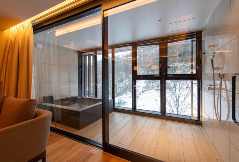 a large bath in the corner of a room