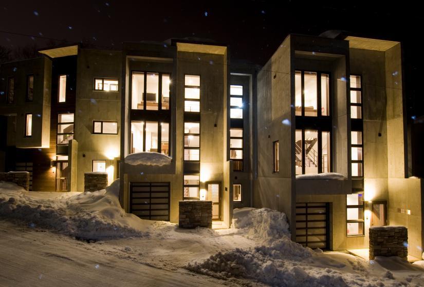 A 3 story townhouse at night