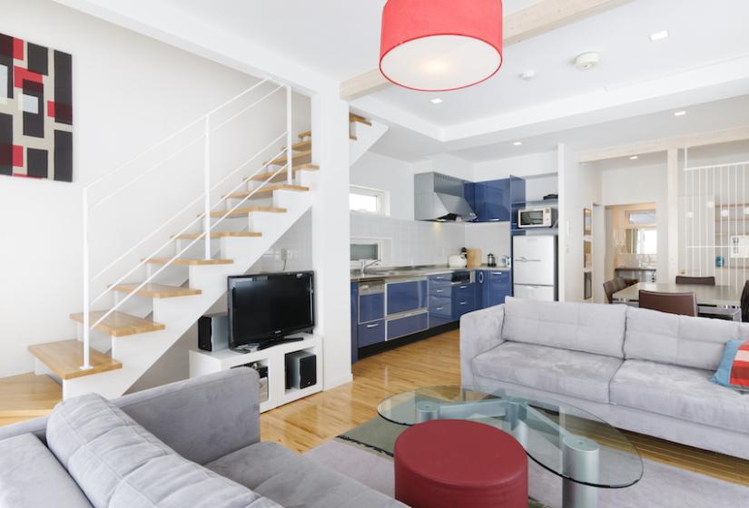 2 lounge suites and stairs to the left 
