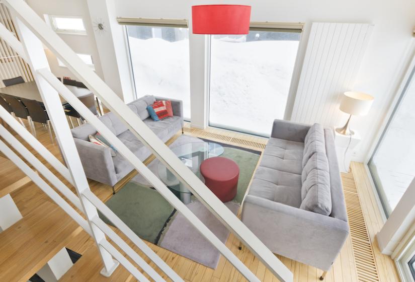 A view of two grey couches from above