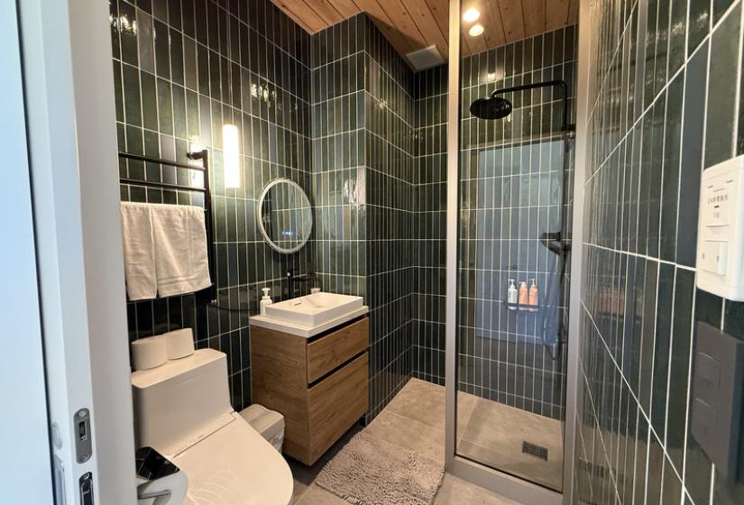 A green tiled bathroom 