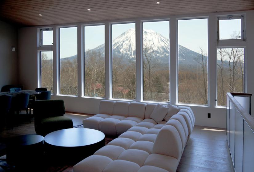 A lounge suite and Mt Yotei behind