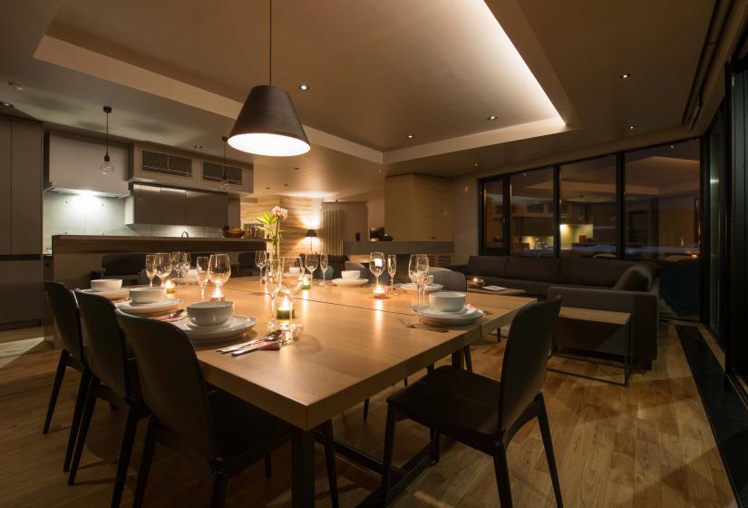 A set dining table with hanging light shade