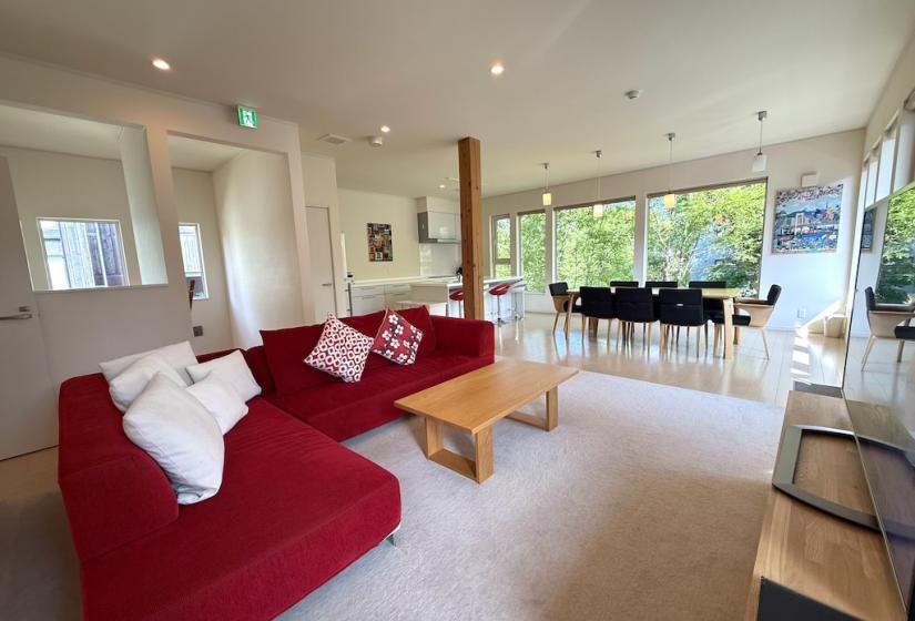 A red lounge suite with white cushions
