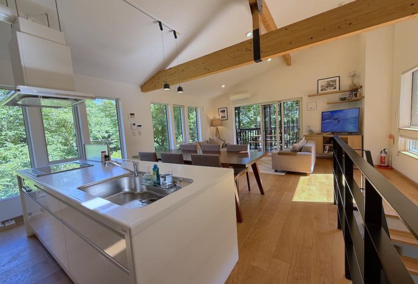 A kitchen bench and table in front