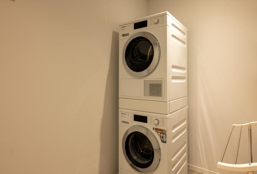 Stacked Miele washer and dryer in the laundry, Setsuei Niseko