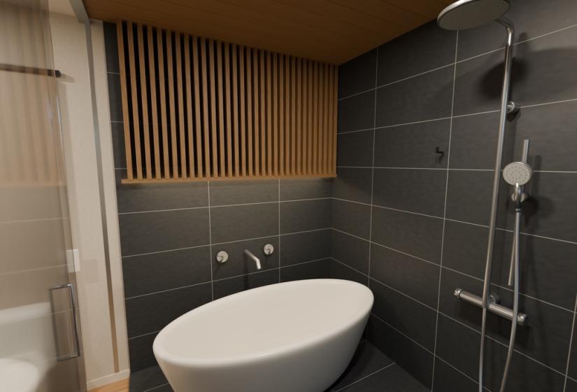 An oval bath in a bathroom